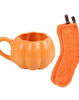 Taza calabaza con calcetines