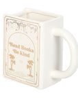 Taza blanca en forma de libro