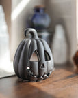 Soporte para velas con forma de calabaza