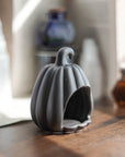 Soporte para velas con forma de calabaza