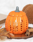 Quemador de aceite y ceras en forma de calabaza naranja