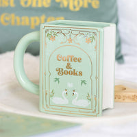 Taza verde en forma de libro