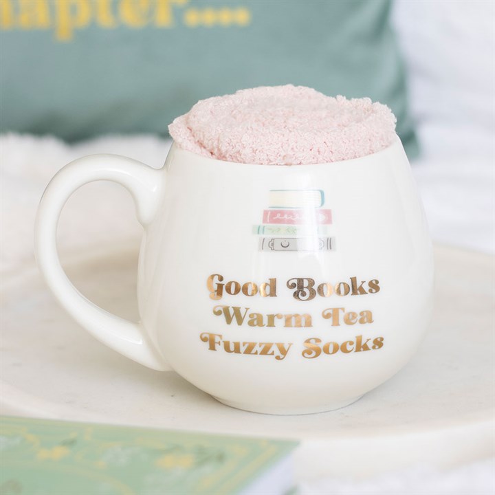 Taza de cerámica y calcetines