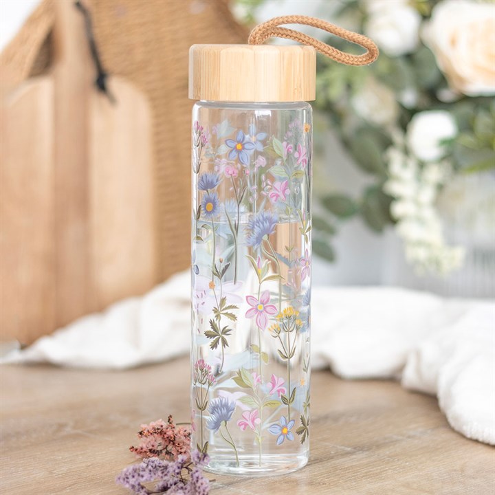Botella de vidrio floral