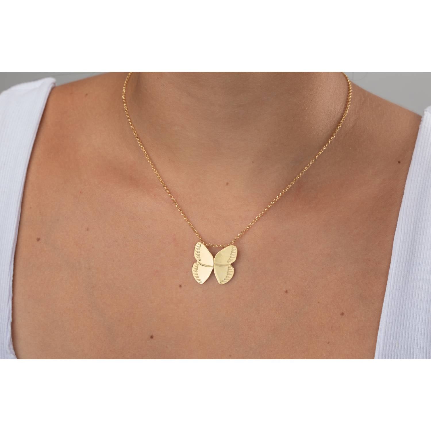Collar mariposa - oro y plata