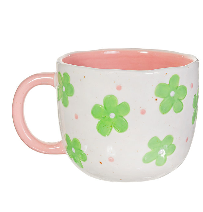 Taza con figurita de rana en el interior