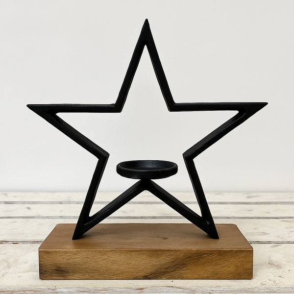 Candelabro de metal con estrella