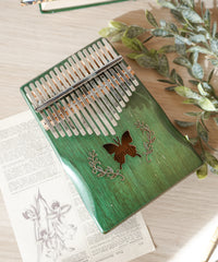 Kalimba de madera con mariposa