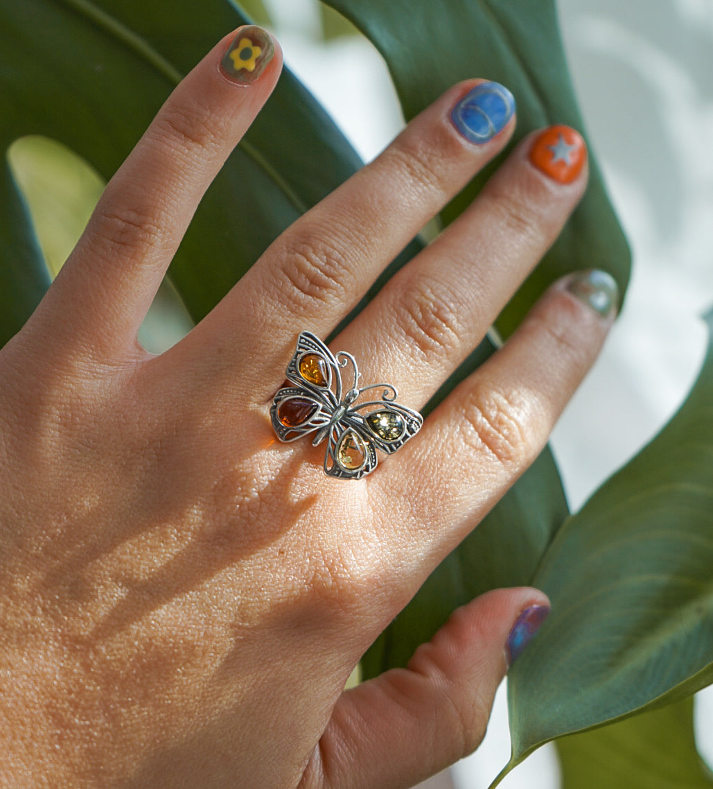 Anillo mariposa de ámbar y plata