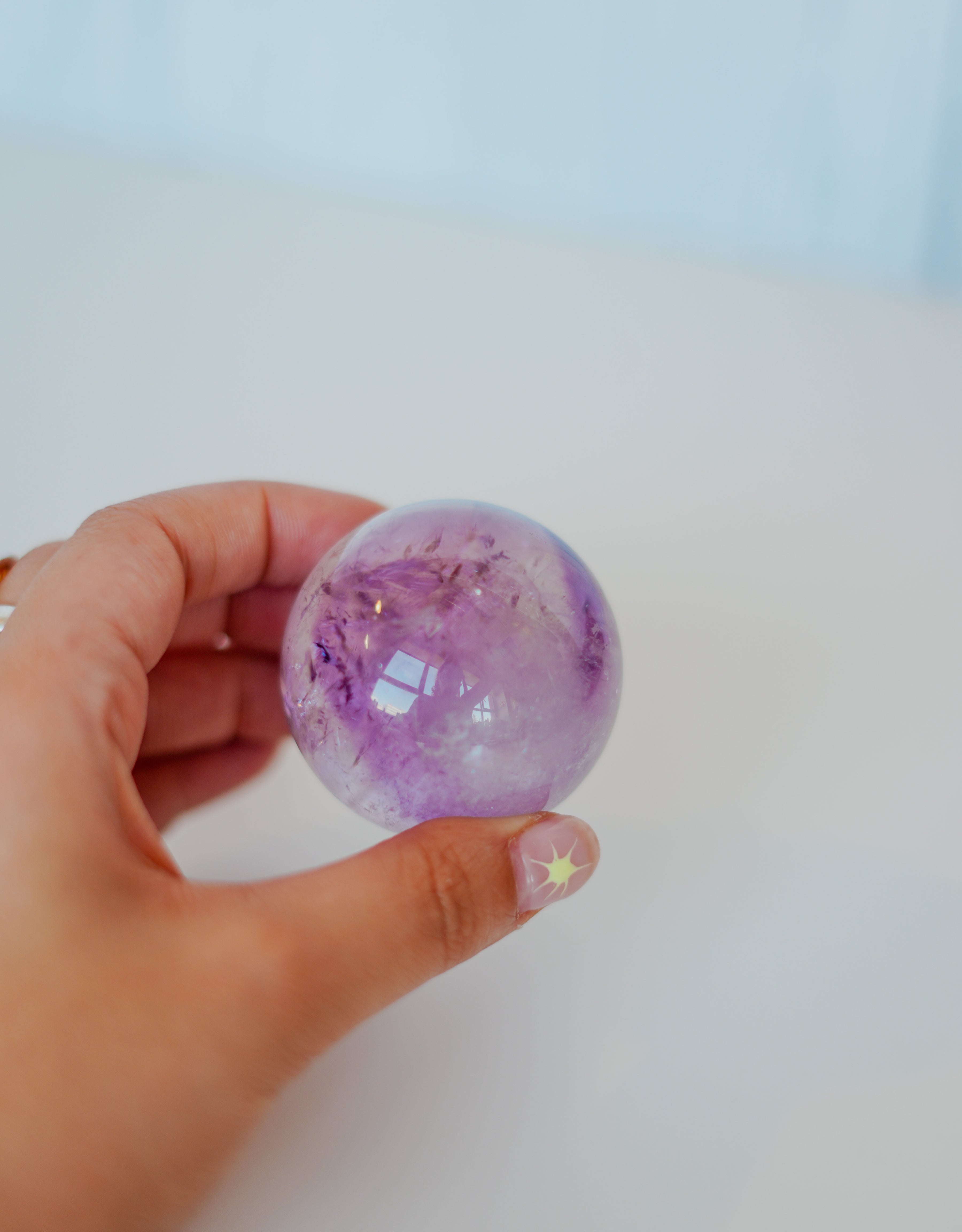 Esfera de amatista con cuarzo