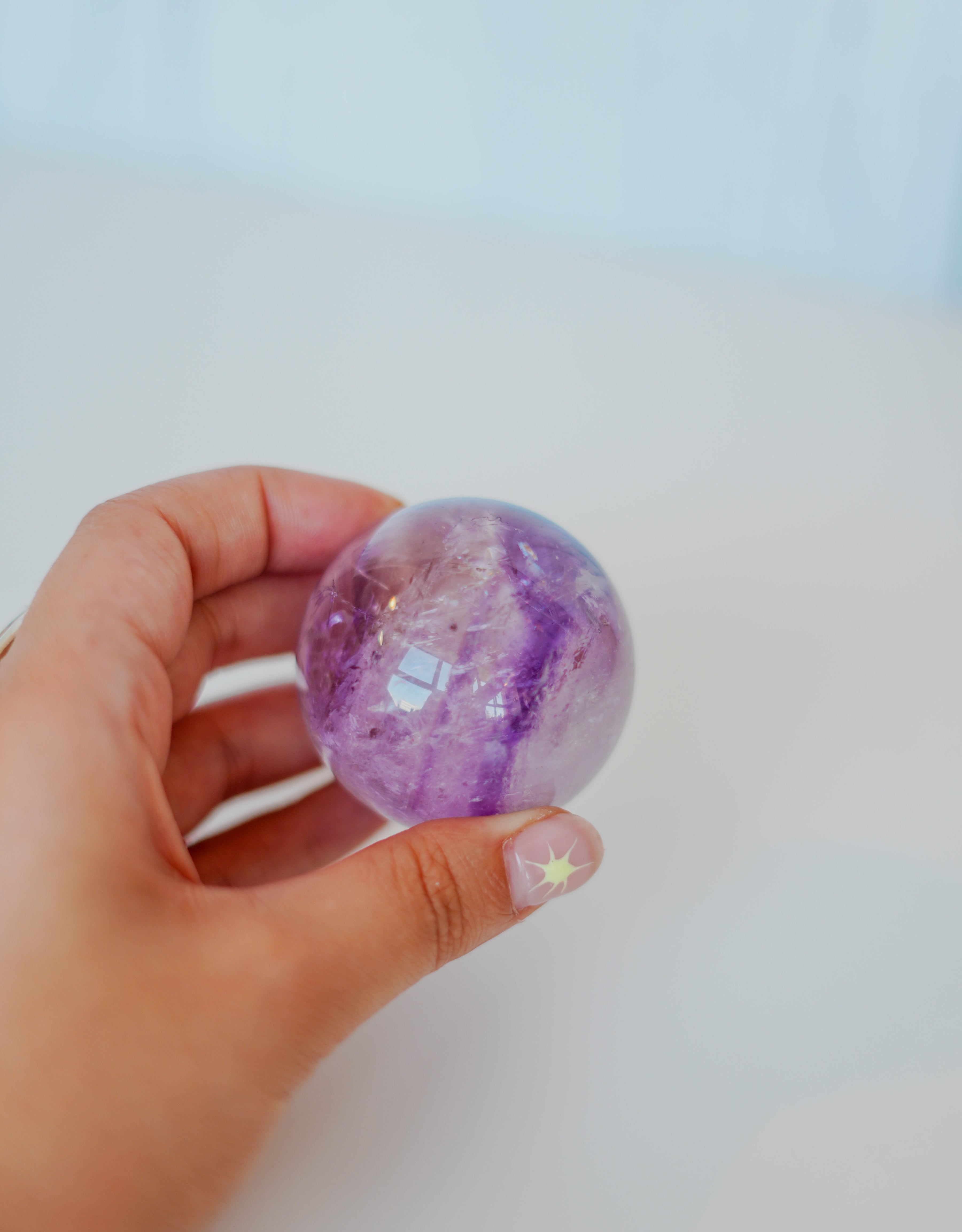 Esfera de amatista con cuarzo