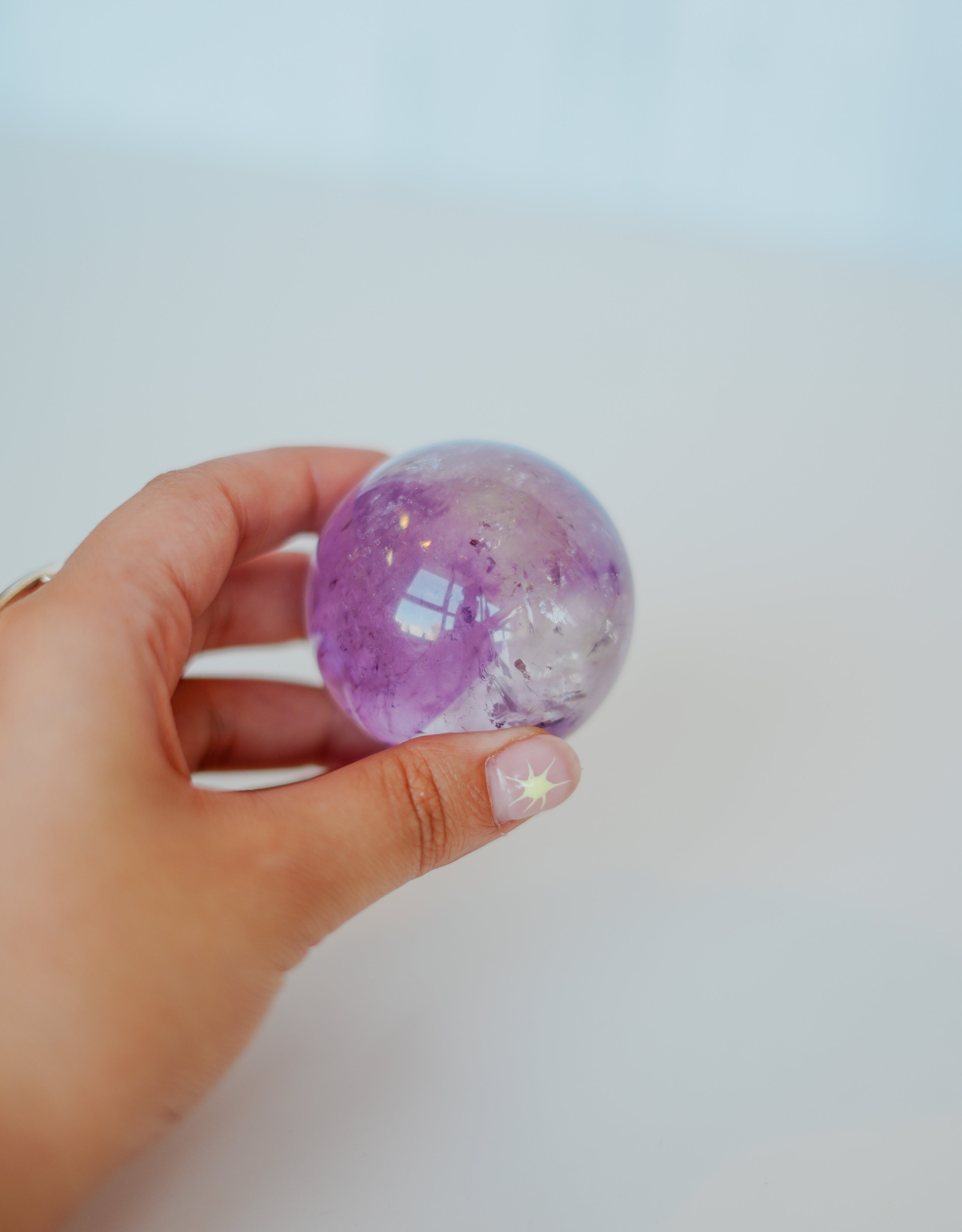 Esfera de amatista con cuarzo