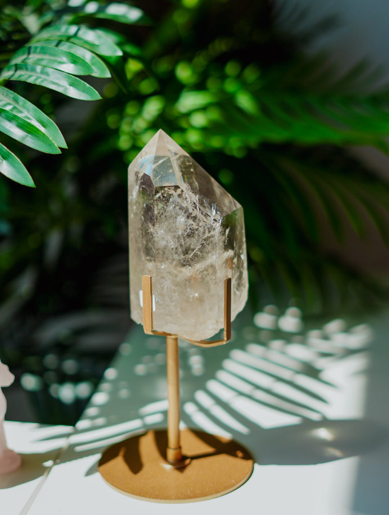 Punta en Stand de Cuarzo Cristal