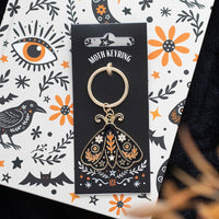 Llavero de aleación y esmalte «Folk Moth»