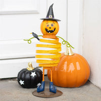 Muñeco de calabaza con sombrero de bruja
