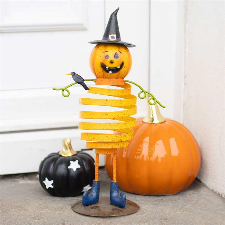 Muñeco de calabaza con sombrero de bruja