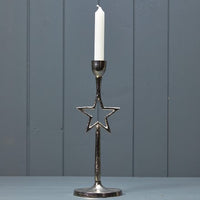 Candelabro plateado con estrella
