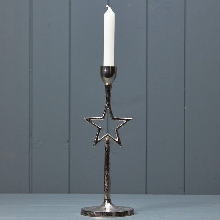 Candelabro plateado con estrella
