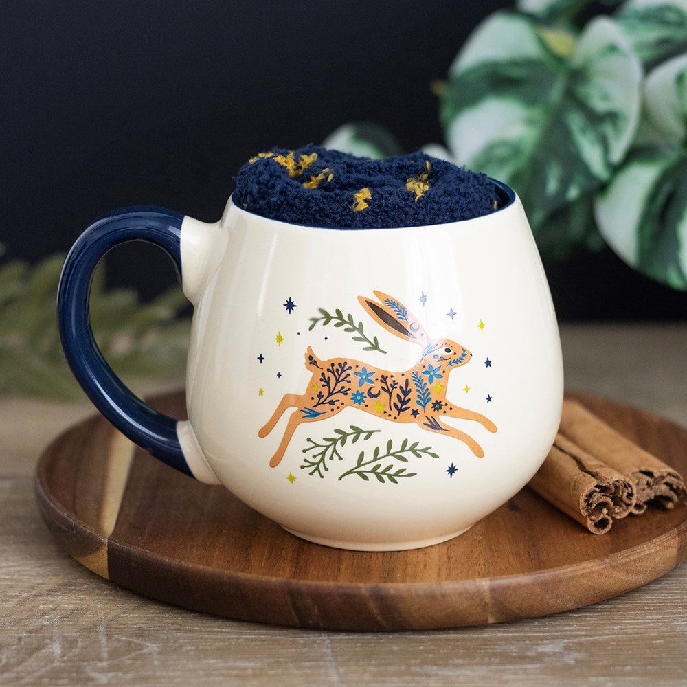 Taza redondeada de cerámica «Leaping Hare» y calcetines