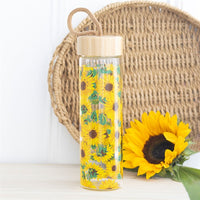 Botella de vidrio floral