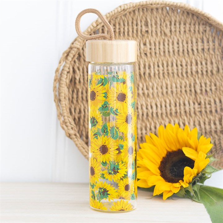 Botella de vidrio floral