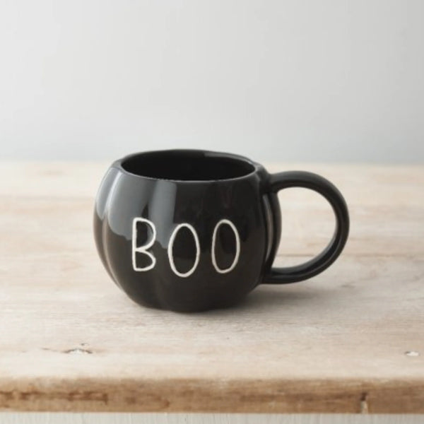 Taza con forma de calabaza “boo”